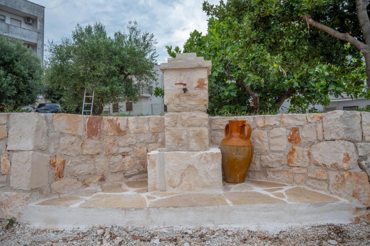 Trulli Dimora Palmisano Apartment โลโกโรตอนโด ภายนอก รูปภาพ