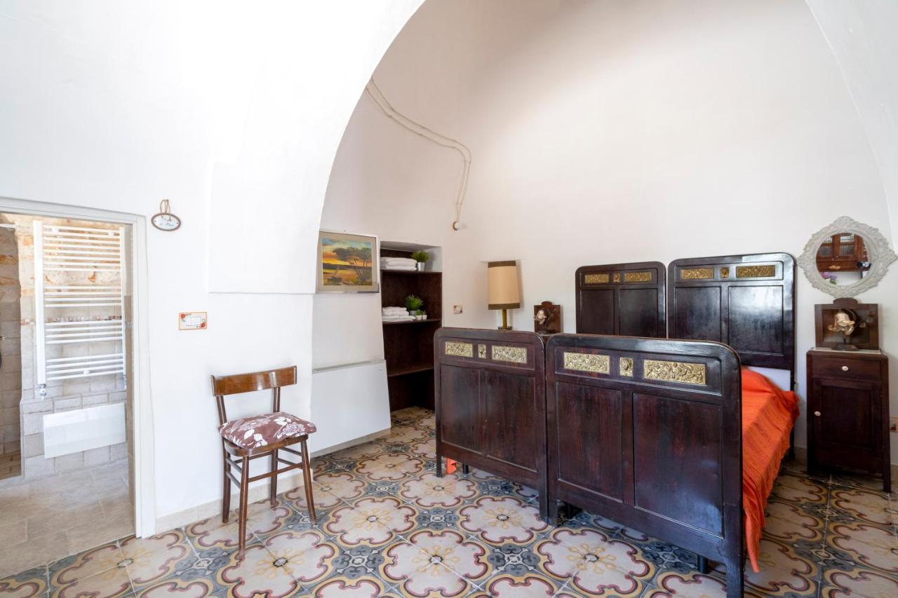 Trulli Dimora Palmisano Apartment โลโกโรตอนโด ภายนอก รูปภาพ