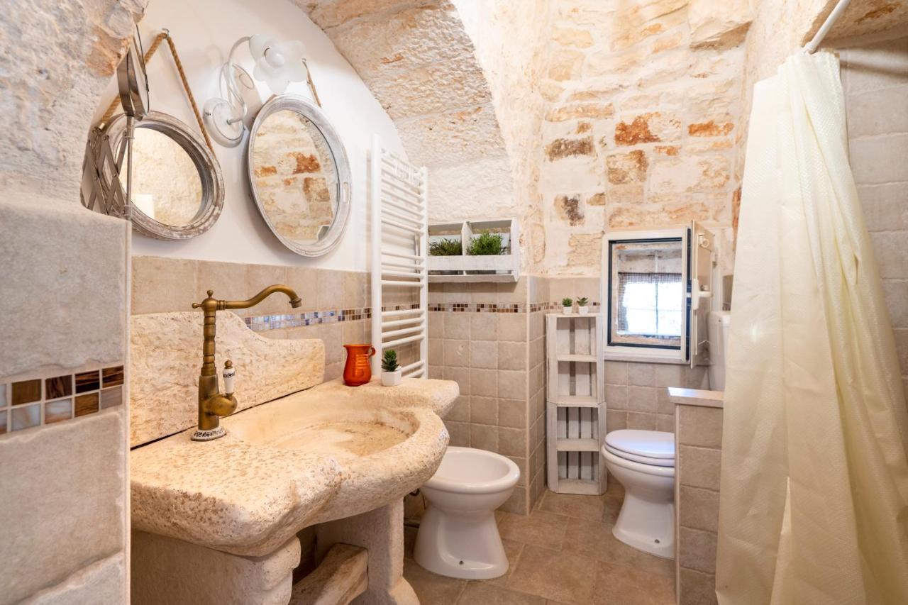 Trulli Dimora Palmisano Apartment โลโกโรตอนโด ภายนอก รูปภาพ