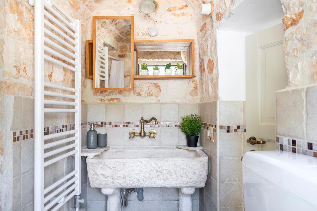 Trulli Dimora Palmisano Apartment โลโกโรตอนโด ภายนอก รูปภาพ